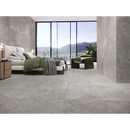 Moderne slaapkamer met olijfgroen beddengoed en Stoneland Grey mat 80x80 rett