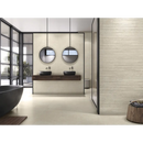 Moderne badkamer met Stoneland Ivory Kibo decor wandtegel en ronde spiegels