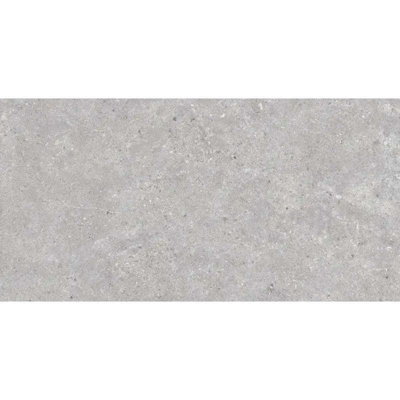 Grijze betonnen ondergrond met spikkelpatronen van Stoneland Pearl mat 60x120 rett