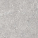 Mottled grey concrete surface of Stoneland Pearl mat 60x60 rett for stylish interiors