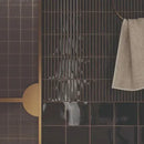 Donkere tegels met gouden accenten van Zoete Ebbenhout Staven 12,5x25