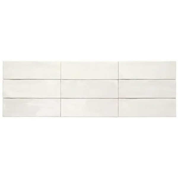 White glossy ceramic subway tile with subtle horizontal stripes from TopTegels Beach Wit