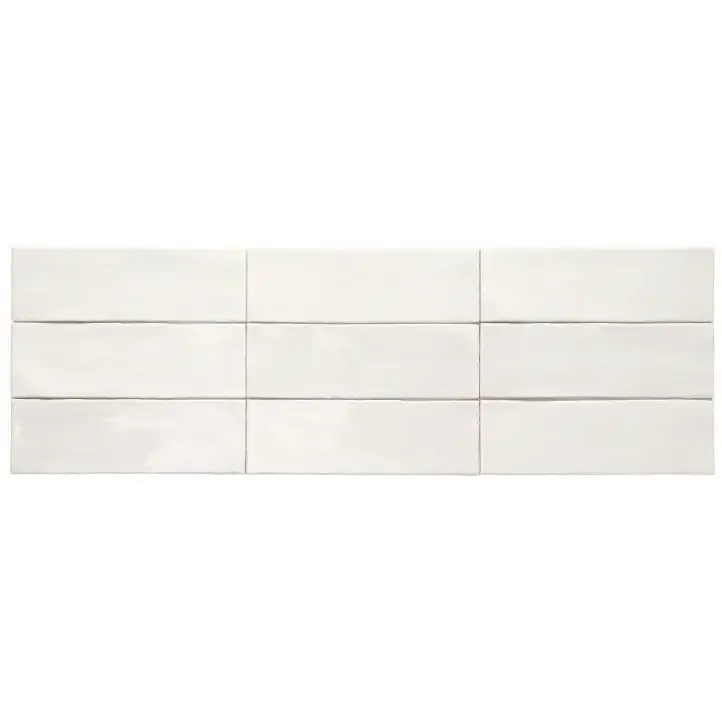 White glossy ceramic subway tile with subtle horizontal stripes from TopTegels Beach Wit