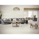 Moderne grijze hoekbank met decoratieve kussens op Venice Bianco mat 60x120 rett