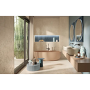 Ronde freestanding badkamer met Vento Del Sud Beige 60x120 rett in zachte blush tint