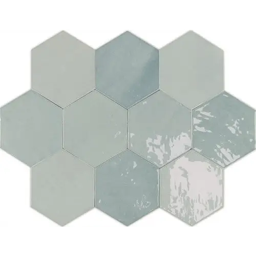 Hexagonale tegels in honingraatpatroon met zachte groene en grijze tinten van Zellige Hexa Aqua