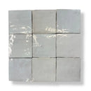 Nine lichtgrijze zellige tegels blanc 10x10 met subtiele glans en natuurlijke imperfecties als vloertegels