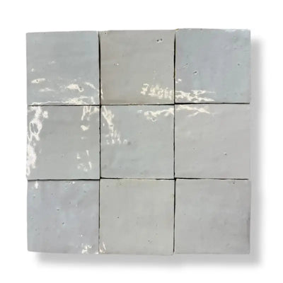 Nine lichtgrijze zellige tegels blanc 10x10 met subtiele glans en natuurlijke imperfecties als vloertegels