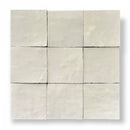 Negen witte vierkante tegels in een 3x3 grid van Zelliges Alhambra Ivoire 10x10 cm