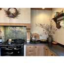 Zwarte Smeg fornuis met meerdere ovens, perfect voor Zelliges Alhambra tegels