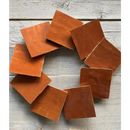 Vierkante stukken melkchocolade in cirkel, Zelliges Alhambra 10x10 cm terracotta