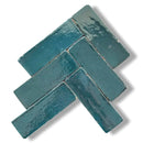 Teal Zelliges Alhambra Bejmat Petrol 5x15 cm in een geometrisch patroon