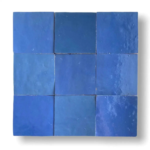 Negen blauwe keramische tegels in een 3x3 vierkant, Zelliges Alhambra Bleu Holandaise